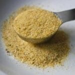 Goya Adobo Seasoning in spoon