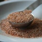 seasoned salt in metal spoon
